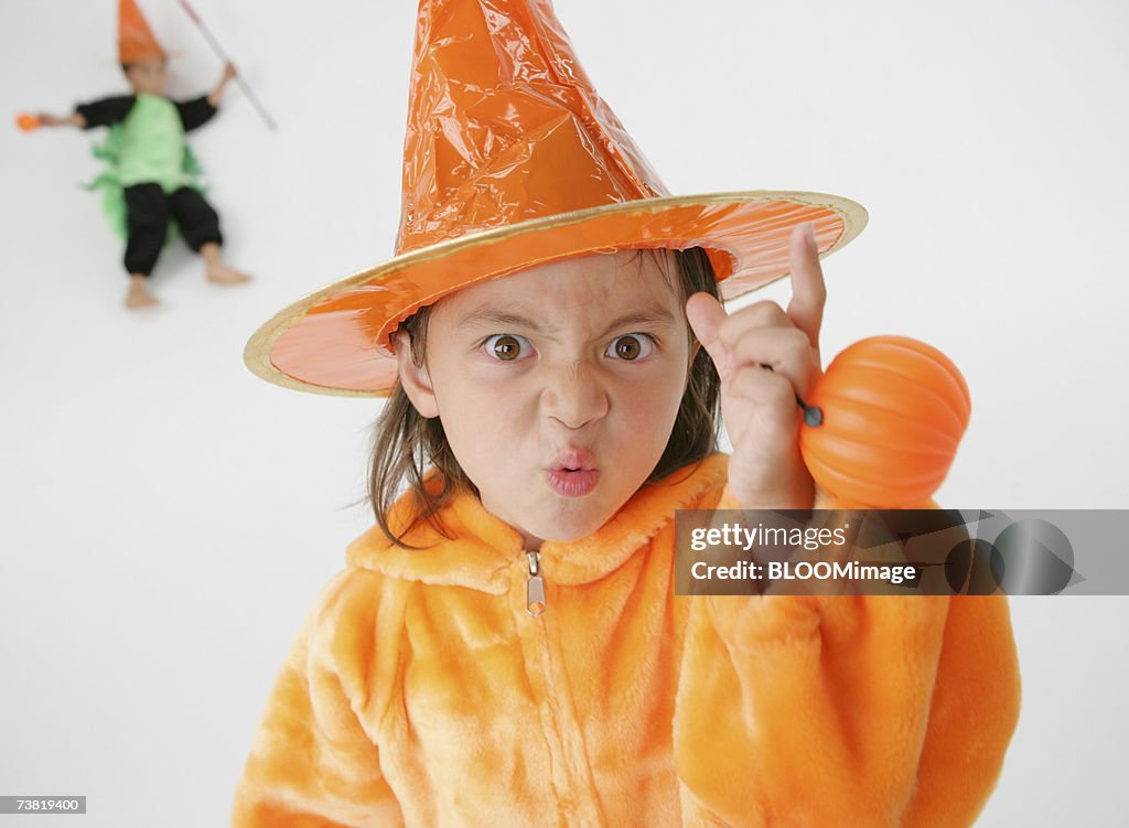 The children who are doing makeup of Halloween