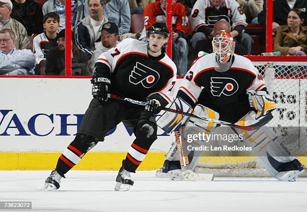 Ryan Parent and Martin Biron of the Philadelphia Flyers skate during the NHL game against the New Jersey Devils at the Wachovia Center on April 5,...