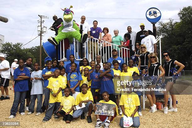 Orlando Magic players Bo Outlaw, Carlos Arroyo, Tony Battie and Dwight Howard join forces with 300 volunteers from the Orlando Magic and the City of...