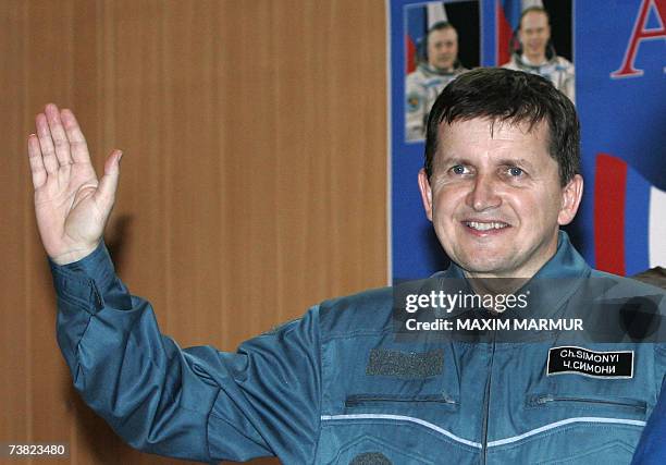 Former Microsoft software developer Charles Simonyi waves to a media after a press conference at Baikonur Cosmodrome in Kazakhstan, 06 April 2007....