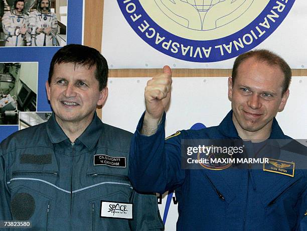 Former Microsoft software developer Charles Simonyi , and Russian cosmonauts Oleg Kotov pose after a press conference at Baikonur cosmodrome in...