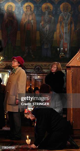 Bulgarian Orthodox attend the Good Friday mass at Sveti Sedmochislenici church in Sofia, 06 April 2007. AFP PHOTO / BORYANA KATSAROVA