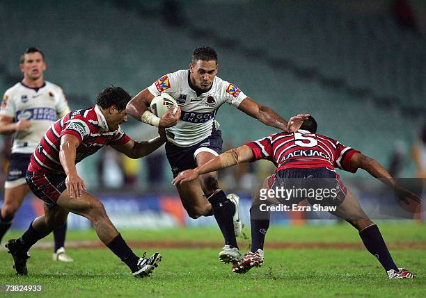 Justin Hodges of the Brisbane Broncos tries to run through the Sydney defence during the round four NRL match between the Sydney Roosters and the...