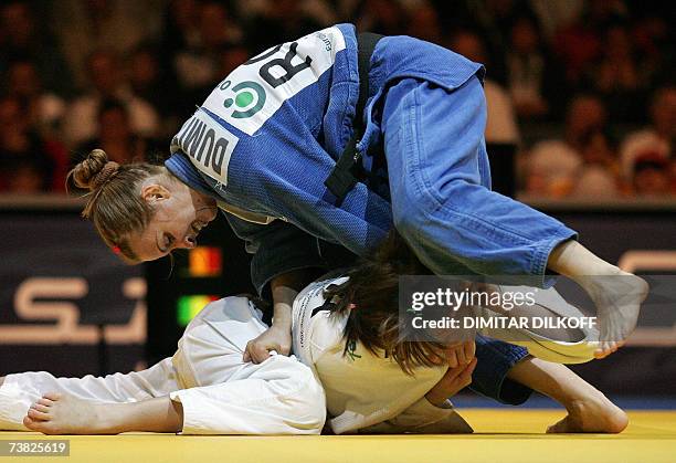 Romania's Alina Alexandra Dumitru vies with Italy's Valentina Moscatt in the women's 48 kg final during Euro Judo Championship in Belgrade, 06 April...