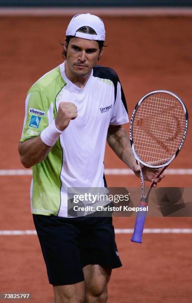 Tommy Haas of Germany celebrates his victory over Kristof Vliegen of Belgium after the first day of the Tennis Davis Cup Quarter Final match at the...