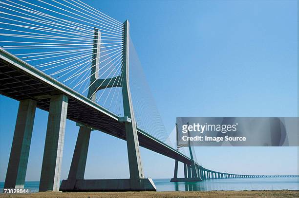 ponte vasco da gama, lisbon, portugal - ponte vasco da gama stock-fotos und bilder
