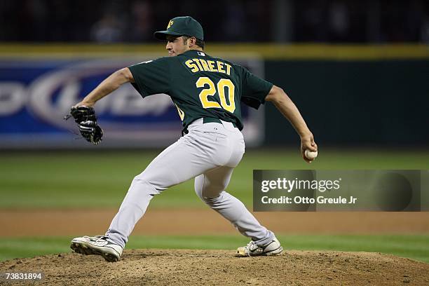 Huston Street of the Oakland Athletics pitches during the opening day game against the Seattle Mariners on April 4, 2007 at Safeco Field in Seattle,...