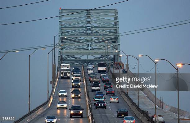Traffic on Long Beach's Gerald Desmond Bridge passes over the ports of Long Beach and Los Angeles March 29 in Los Angeles, CA. The165-foot-high,...