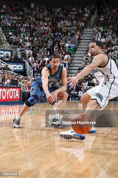 Marko Jaric of the Minnesota Timberwolves passes against Deron Williams of the Utah Jazz during a game at the EnergySolutions Arena on March 28, 2007...