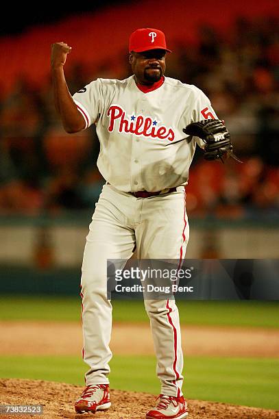 Pitcher Antonio Alfonseca of the Philadelphia Phillies celebrates after ending the eighth inning against the Florida Marlins at Dolphin Stadium on...