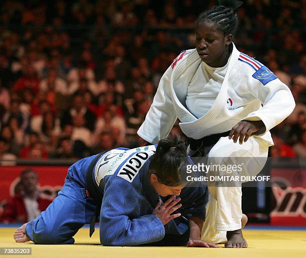 Gevrise Emane of France vies with Katarzyna Pilocik of Poland in the women's 70 kg final final of the Euro Judo Championship in Belgrade, 07 April...