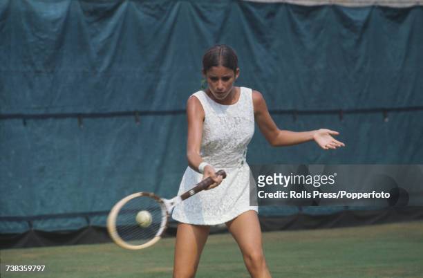 American tennis player Chris Evert pictured in action against Edda Buding of West Germany in the first round during competition to progress to the...