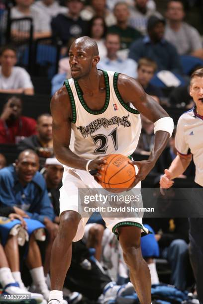 Kevin Garnett of the Minnesota Timberwolves gets ready to make a play in the game against the New Orleans/Oklahoma City Hornets at the Target Center...