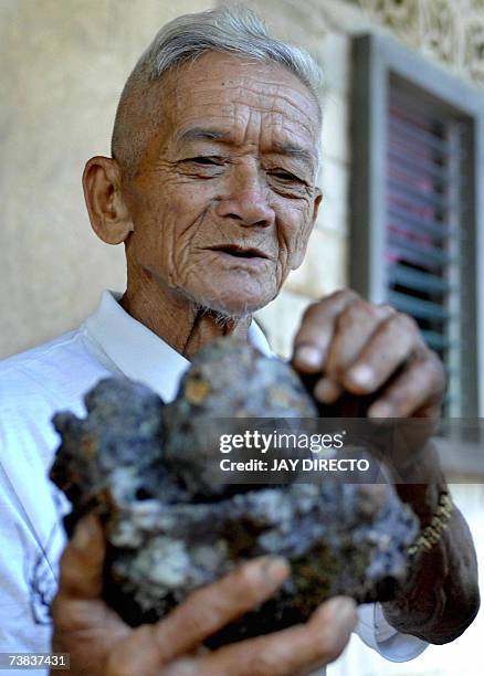 Siquijor, PHILIPPINES: TO GO WITH Philippines-religion-magic-witchcraft,sched-FEATURE by Karl Wilson Pedro "Endoy" Tumapon shows one of his 260 kinds...