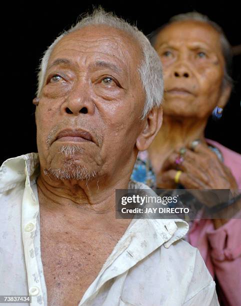 Siquijor, PHILIPPINES: TO GO WITH Philippines-religion-magic-witchcraft,sched-FEATURE by Karl Wilson Lolo Juan Ponce and his wife are pictured in the...