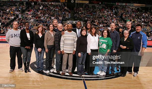 Several Dallas Independent School District teachers are honored by Dallas Mavericks President Terdema Ussery during half-time of the Dallas Mavericks...