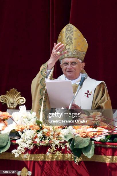 Pope Benedict XVI gives his 'Urbi et Orbi' message and blessing from the Central Loggia of St. Peter's Basilica at the end of Easter Sunday Mass,...