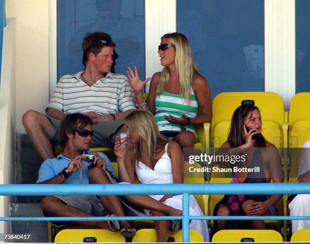 Prince Harry watches the cricket with his girlfriend Chelsy Davy during the ICC Cricket World Cup 2007 Super Eight match between England and...