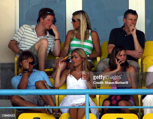Prince Harry watches the cricket with his girlfriend Chelsy Davy during the ICC Cricket World Cup 2007 Super Eight match between England and...