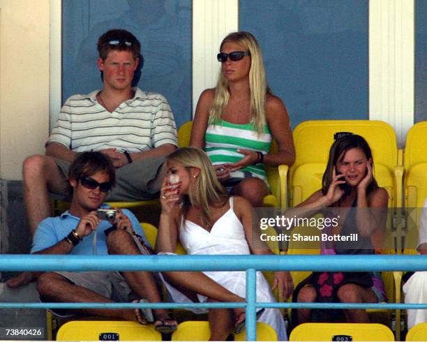 Prince Harry watches the cricket with his girlfriend Chelsy Davy during the ICC Cricket World Cup 2007 Super Eight match between England and...