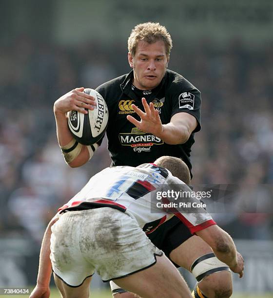 John Hart of London Wasps get tackled by Dan Scarbrough of Saracens during the Guinness Premiership match between London Wasps and Saracens at Adams...