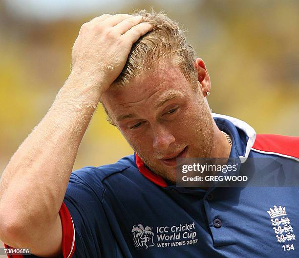 St John's, ANTIGUA AND BARBUDA: England batsman Andrew Flintoff rubs his head as he leaves the field after he was dismissed during the Cricket World...