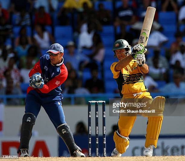 Ricky Ponting, the Australia captain, plays a shot as Paul Nixon, the England wicket-keeper, looks on during the ICC Cricket World Cup 2007 Super...