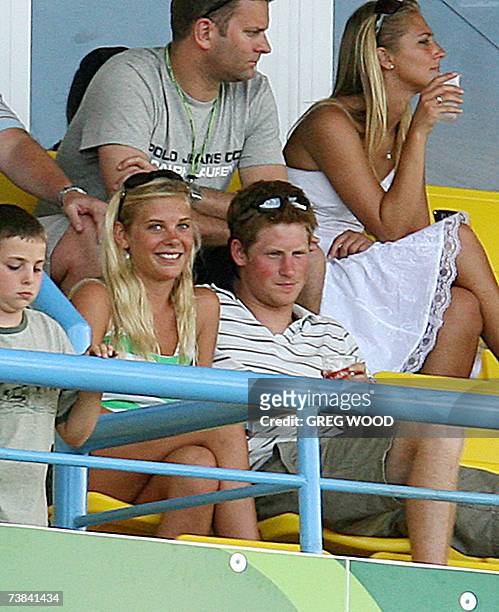 St John's, ANTIGUA AND BARBUDA: Britain's Prince Harry looks on with his girlfriend Chelsy Davy during the ICC World Cup Cricket 2007 Super Eight...