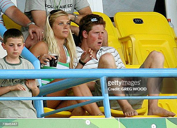 St John's, ANTIGUA AND BARBUDA: Britain's Prince Harry looks on with his girlfriend Chelsy Davy during the ICC World Cup Cricket 2007 Super Eight...