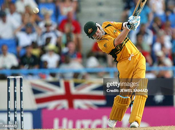 St John's, ANTIGUA AND BARBUDA: Australian cricketer Michael Clarke hits a boundary off England's bowler Sajid Mahmood during the ICC World Cup...