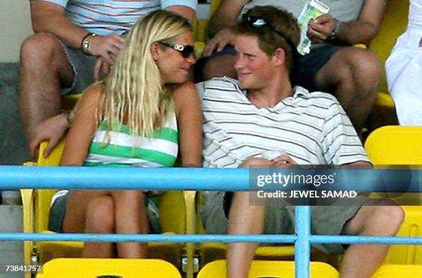 St John's, ANTIGUA AND BARBUDA: Britain's Prince Harry admires his girlfriend Chelsy Davy as they watch the ICC World Cup Cricket 2007 Super Eight...