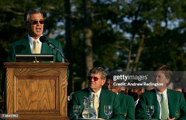 Masters Tournament Chairman Billy Payne speaks during the green jacket presentation as Hootie Johnson and Fred Ridley look on after the final round...