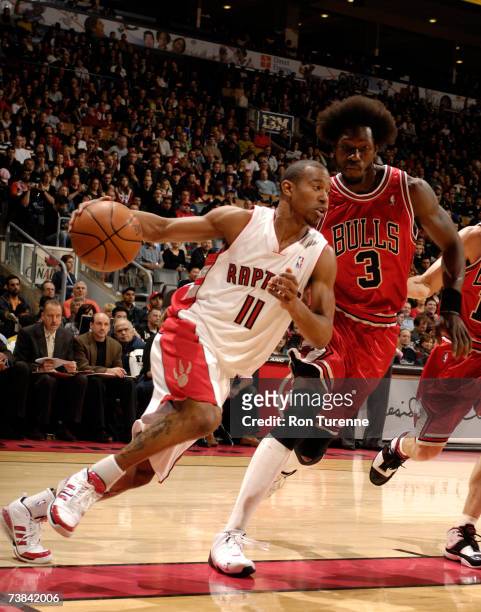 Ford of the Toronto Raptors drives against Ben Wallace of the Chicago Bulls on April 8, 2007 at the Air Canada Centre in Toronto, Canada. NOTE TO...