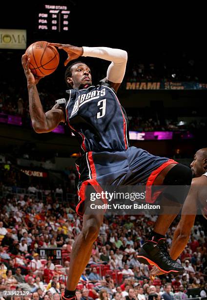 Gerald Wallace of the Charlotte Bobcats grabs a rebound against the Miami Heat on April 8, 2007 at American Airlines Arena in Miami, Florida. NOTE TO...