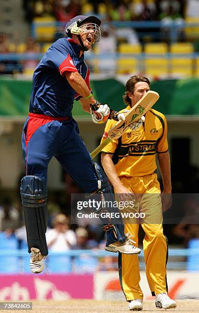 St John's, ANTIGUA AND BARBUDA: England's Kevin Pietersen jumps in the air in celebration after reching his century during the Cricket World Cup...