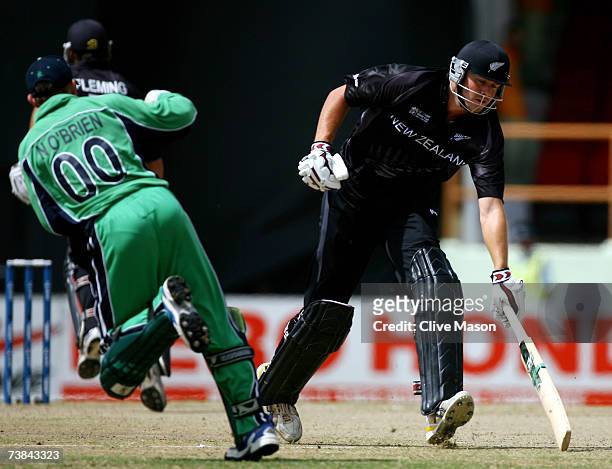 Peter Fulton of New Zealand makes his ground during the ICC Cricket World Cup Super Eights match between Ireland and New Zealand at the Guyana...