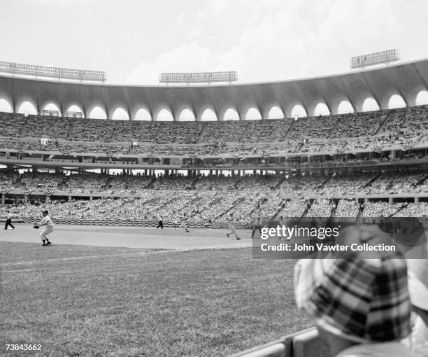 Thirdbaseman Brooks Robinson, of the Baltimore Orioles, pulls up at thirdbase after hitting a triple off Sandy Koufax, of the Los Angeles Dodgers,...