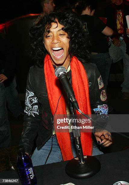 Actress Jada Pinkett Smith, lead singer of rock group Wicked Wisdom, laughs as she is interviewed backstage at Xtreme Rock Radio 10-year anniversary...