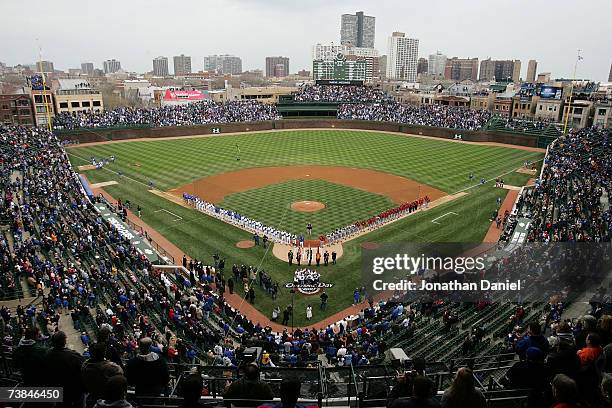 Fans take their seats before the Chicago Cubs take on the Houston Astros during the Cubs home opener on April 9, 2007 at Wrigley Field in Chicago,...