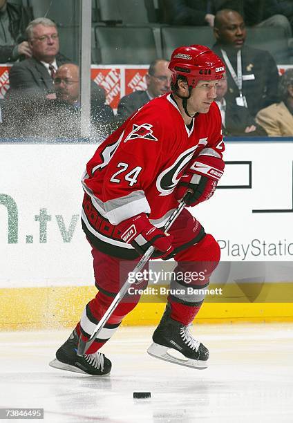 Scott Walker of the Carolina Hurricanes handles the puck against the Toronto Maple Leafs at the Air Canada Centre on March 27, 2007 in Toronto,...