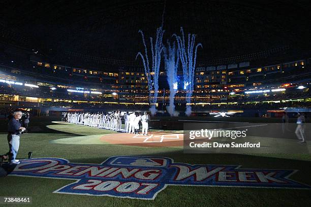 Fireworks light up the outfield following the announcement of the starting lineups for both the Toronto Blue Jays and the Kansas City Royals in their...