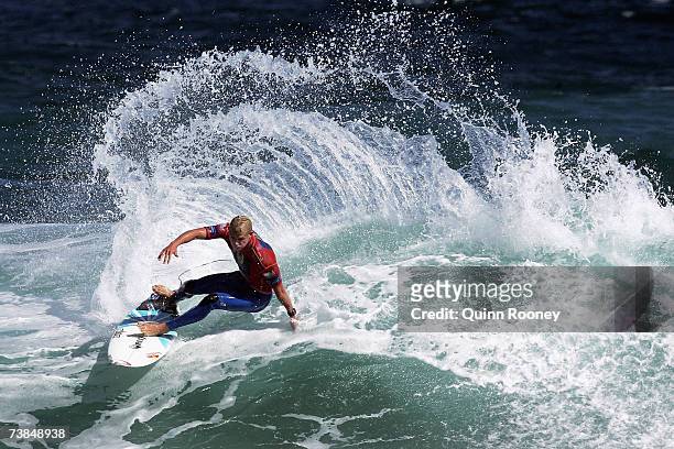 Mick Fanning of Australia carves on the lip of the wave during round three of the Rip Curl Pro on April 10, 2007 at Johanna Beach, Australia.