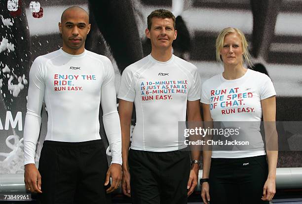 Thierry Henry of Arsenal, Steve Cram, former middle distance runner and Carolina Kluft, current Olympic, World and European heptathlon champion pose...