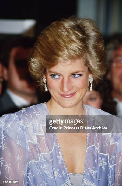 Princess Diana wearing a Zandra Rhodes cocktail dress to a reception at the British Consulate in Dubai, March 1989.