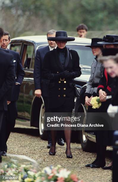 Princess Diana at the funeral of her father, Earl Spencer at Great Brington church, Northamptonshire, March 1992. Prince Charles can be seen, left.