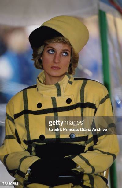 Princess Diana wearing an Escada coat with a hat by Philip Somerville at the naming of the patrol boat Vigilant on the Isle of Wight, December 1989.