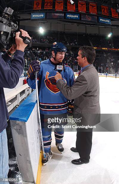 Reporter Jon Kincade interviews Eric Boulton of the Atlanta Thrashers following the game against the Washington Capitals on March 12, 2007 at Philips...