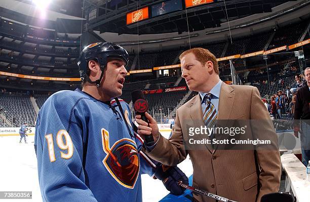 Versus TV Network reporter Bob Harwood interviews Scott Mellanby of the Atlanta Thrashers before the game against the Washington Capitals on March...