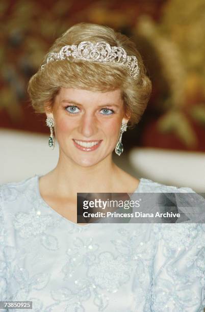 Princess Diana wearing a Catherine Walker gown and the Spencer tiara at a banquet in Munich, November 1987.