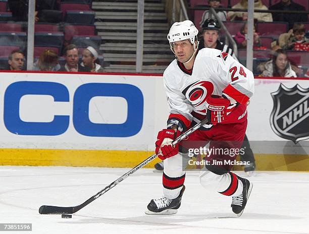 Scott Walker of the Carolina Hurricanes handles the puck during the game against the New Jersey Devils on March 17, 2007 at Continental Airlines...